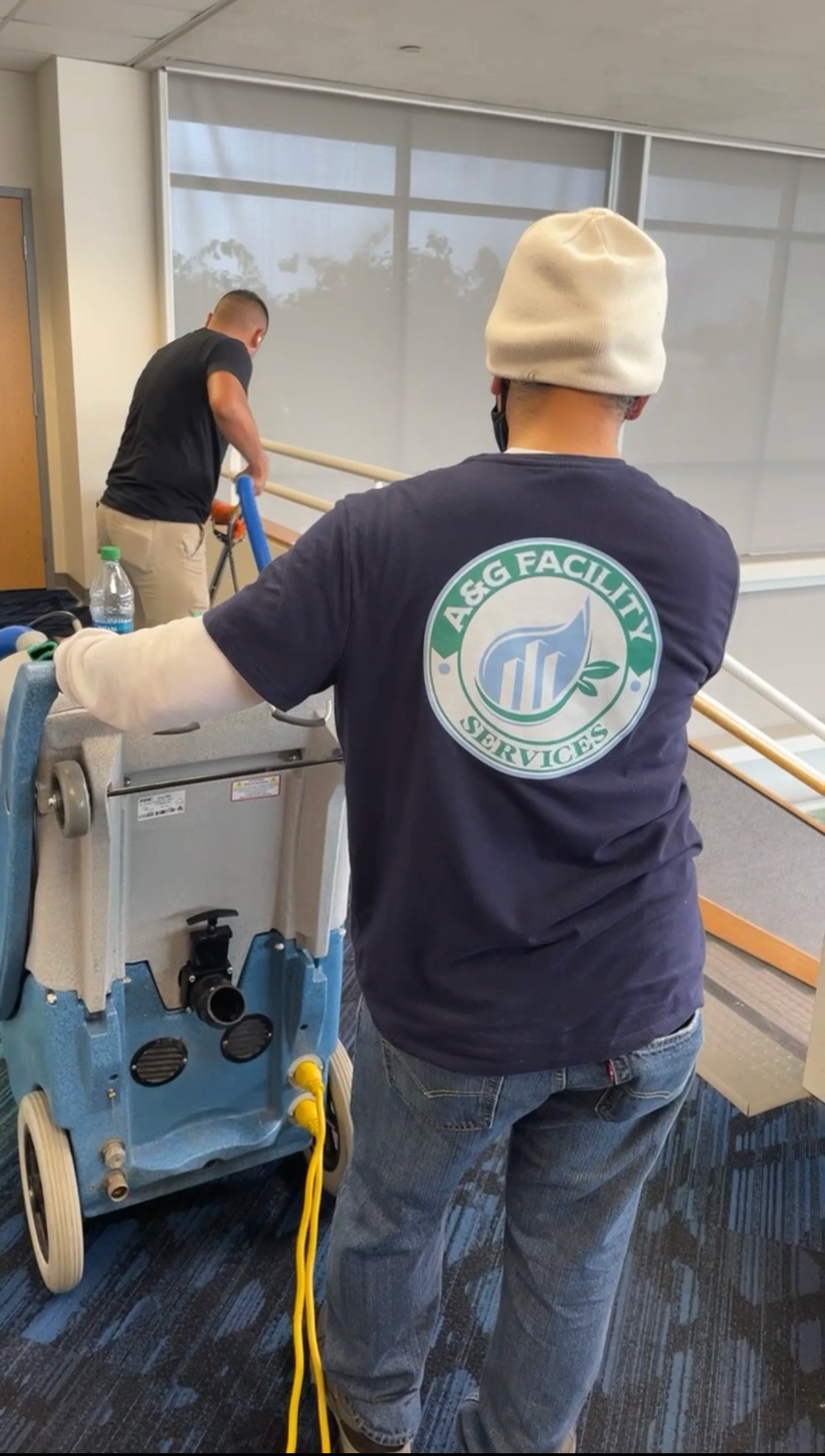 A team from A & G Facility Services cleaning a carpet in Monterey, California