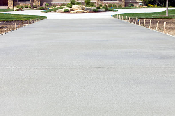 Pressure washing services near Salinas and Monterey renewing a stained driveway for a picture-perfect Fourth of July BBQ.