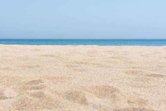 Beach sand embedded in a carpet.